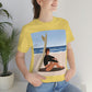 Serenity by the Sea Woman Sitting on Beach Unisex Jersey Short Sleeve T-Shirt Ichaku [Perfect Gifts Selection]